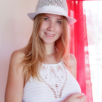 Addie 003 02-playful-blonde-in-white-lingerie-and-stockings-by-the-window.jpg