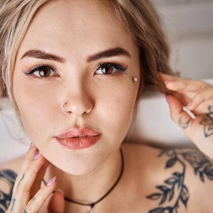 Alena Gzhel 001 05-soft-bath-tease-with-tattoos-and-pink-towel-in-natural-light.jpg