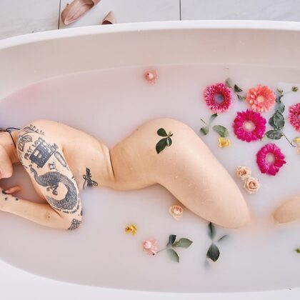 Alena Gzhel 001 09-soft-bath-tease-with-tattoos-and-pink-towel-in-natural-light.jpg