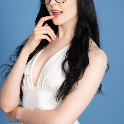 Amelia Riven 001 01-soft-studio-portrait-with-glasses-and-amelia-riven-elegant-mood.jpg
