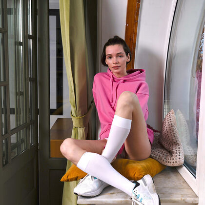 Any Moloko 009 00-ana-moloko-soft-window-tease-in-pink-lingerie-vibe-warm-indoor-scene.jpg