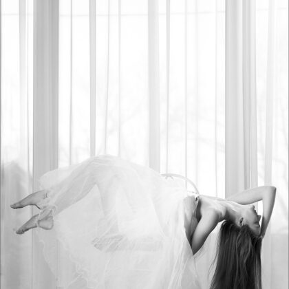 Asha 001 07-asha-posing-with-white-fabric-teasing-softly-by-window.jpg