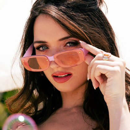 Brooke Tilli 001 01-brooke-tilli-undresses-poolside-in-patterned-bikini-and-pink-wrap.jpg