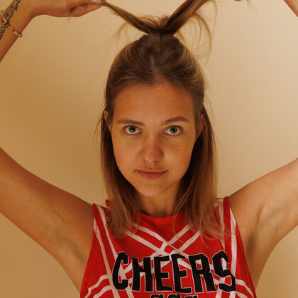 Clubnika Jane 002 02-red-cheerleader-fantasy-and-playful-posing-with-clubnika-jane.jpg