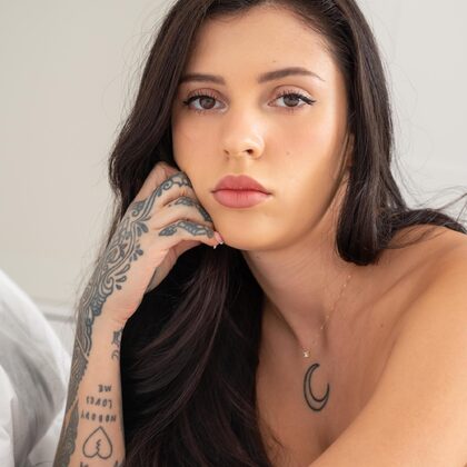 Coralinne 001 10-coralinne-naked-tattooed-brunette-in-soft-indoor-shoot.jpg