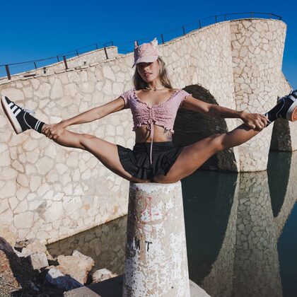 Irene Rouse 002 08-playful-outdoor-poses-on-stone-bridge-with-sporty-irene-energy.jpg