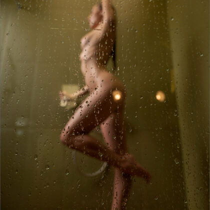 Liana Luck 004 11-wet-shower-posing-with-naked-liana-in-glossy-light-and-white-bodysuit.jpg