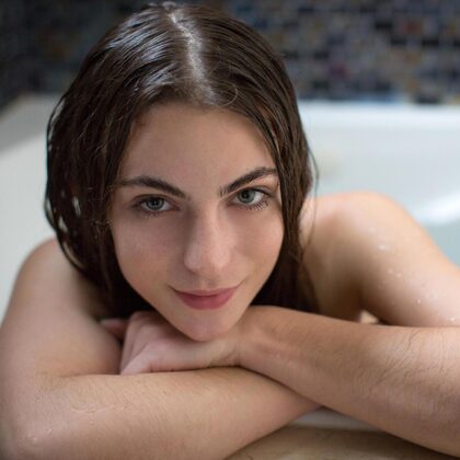 Lunaraise 001 15-floral-swimsuit-tease-in-bathroom-light-with-lunaraise-glow.jpg