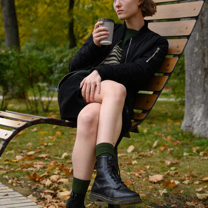 Margo Vishnevska 004 01-margo-vishnevska-cozy-in-green-sweater-and-boots-indoors.jpg