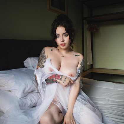 Neveska 001 12-neveska-in-white-lace-lingerie-shows-off-her-tattooed-curves.jpg