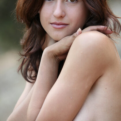 Olja 002 14-forest-log-posing-with-olja-in-soft-natural-light-and-calm-mood.jpg