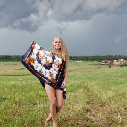 Sarika A 068 01-natural-meadow-portrait-with-darina-beneath-stormy-summer-skies.jpg