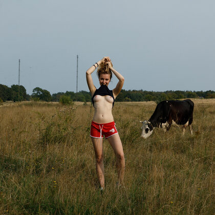 Sonya Buse 003 05-blonde-beauty-outdoors-in-red-shorts-teasing-under-sun.jpg