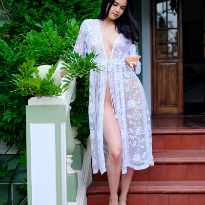 Tutsi 001 03-tutsi-lounging-in-lace-robe-on-the-terrace-with-gentle-charm.jpg