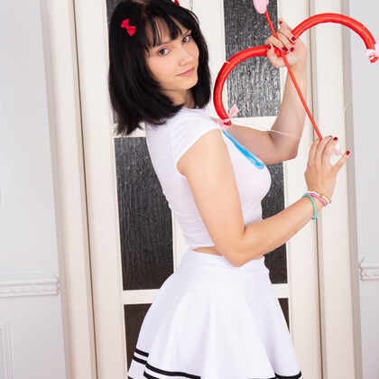 Virginica 001 01-virginica-playful-strip-in-white-top-and-skirt-with-angel-vibe.jpg