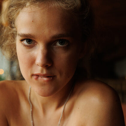 Xenia 004 03-xena-khrabry-teasing-in-a-cozy-cafe-wearing-glasses-and-denim.jpg