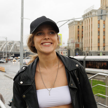 Xenia 005 03-xena-khrabry-flashing-a-smile-in-the-city-wearing-black.jpg