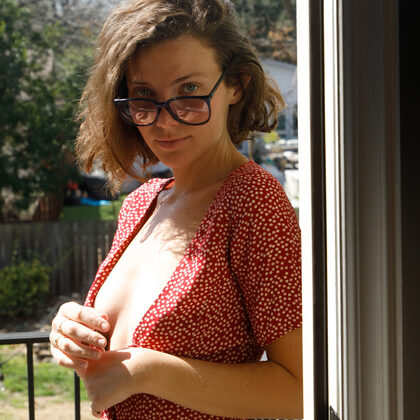 Zeta Bb 002 06-brunette-in-red-polka-dot-dress-teasing-with-sunlight-indoors.jpg